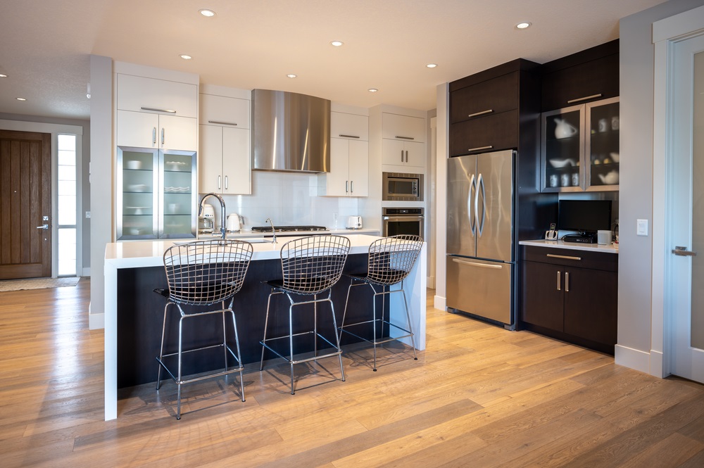 Interior of modern home showing white modern kitchen