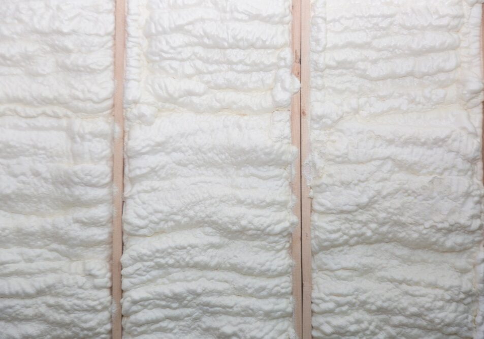 The wall of a new wooden house in foam for insulation and heat