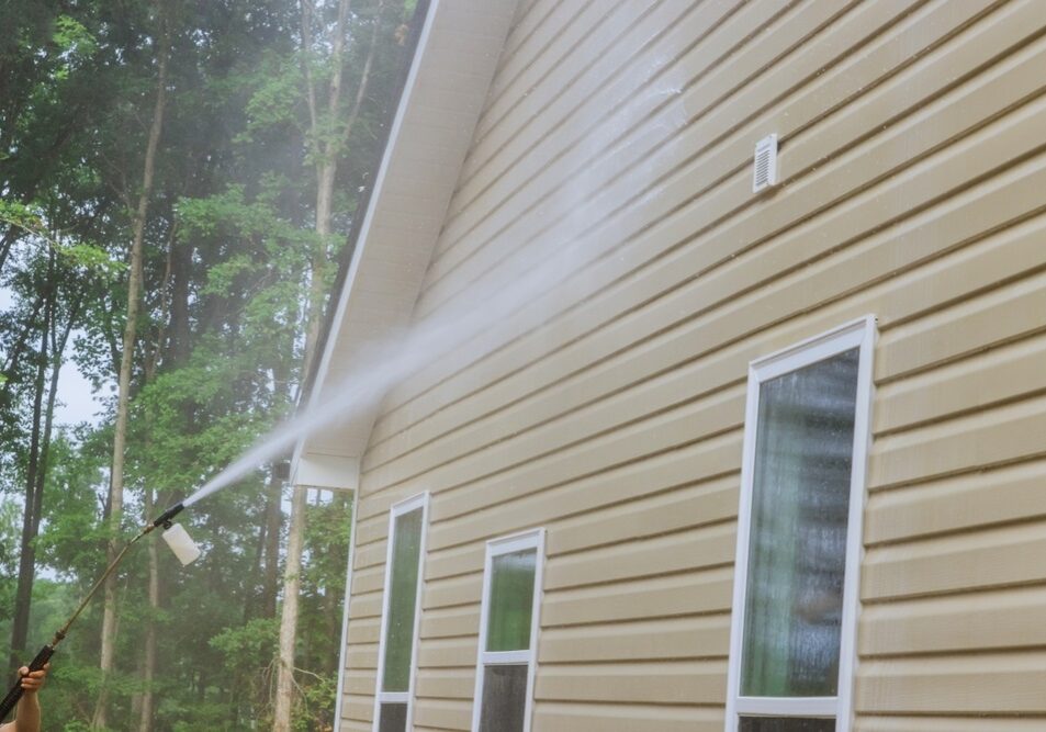 Cleaning maintenance service for washing siding house and maintaining the home a high-pressure spray nozzle with soap cleaner and water