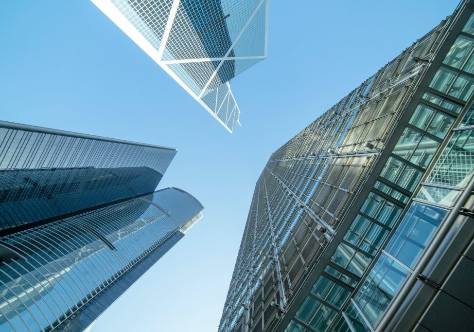 pexels-photo-998499 low angle photography of buildings under blue and white sky